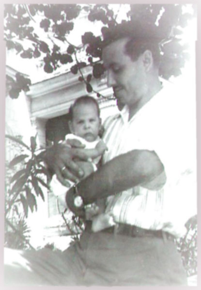 Photo of my dad holding me in his arms in Havana, Cuba. I was just an infant.