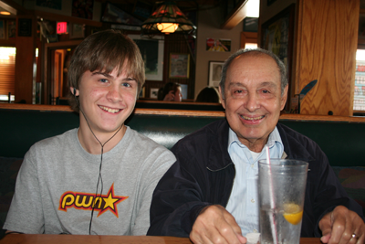 Joey with paternal grandfather at restaurant